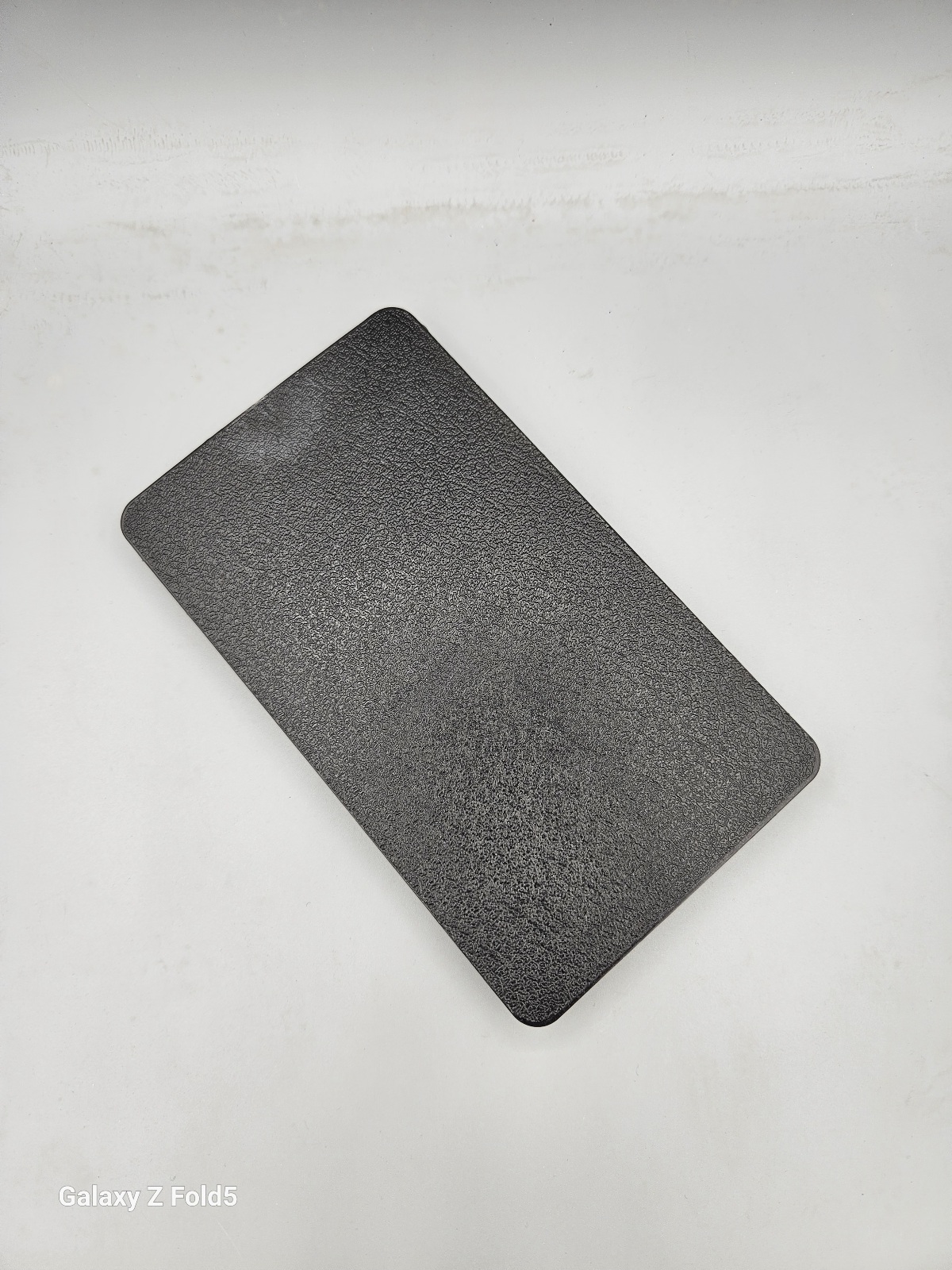 تصویر درب جعبه فیوز سمند مشکی